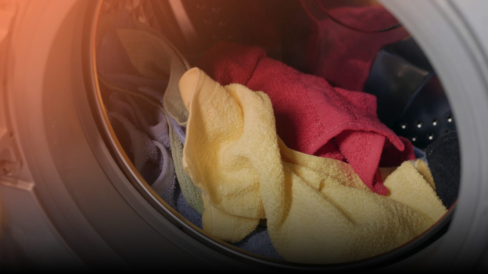 Laundry inside the open drum of a washing machine